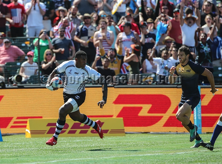 2018RugbySevensSat-23.JPG - Fiji player Kalione Nasoko scores a try against Argentina in the men's championship quarter finals of the 2018 Rugby World Cup Sevens, Saturday, July 21, 2018, at AT&T Park, San Francisco. Fiji defeated Argentina 43-7. (Spencer Allen/IOS via AP)